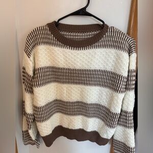 Brown and white sweater.